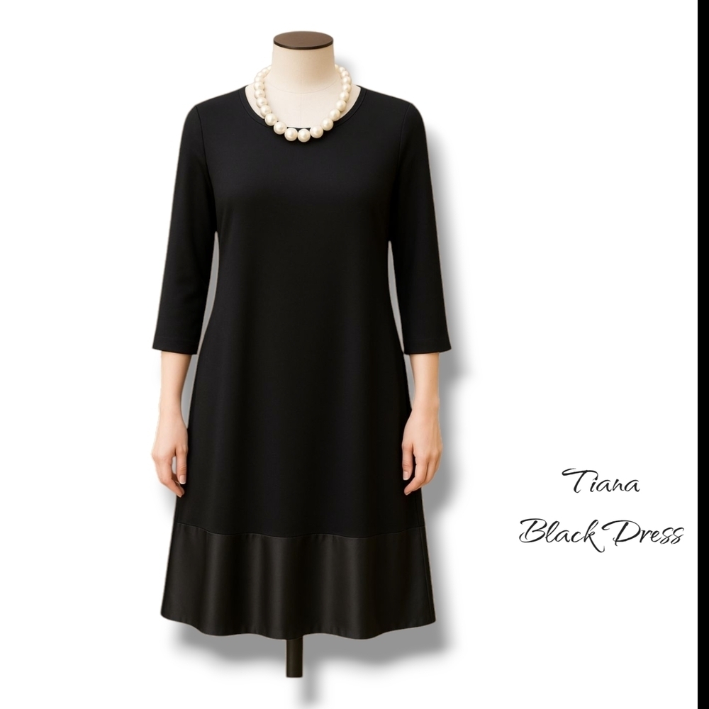 Elegant Black Dress with Pearl Necklace
